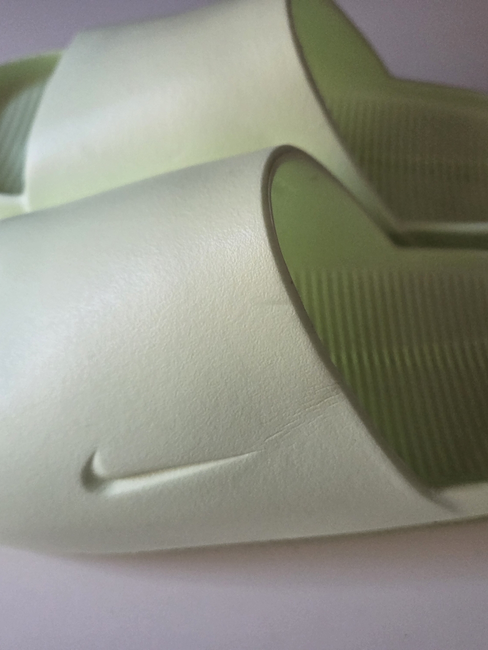 Nike Women’s Pale Green Slide Sandals